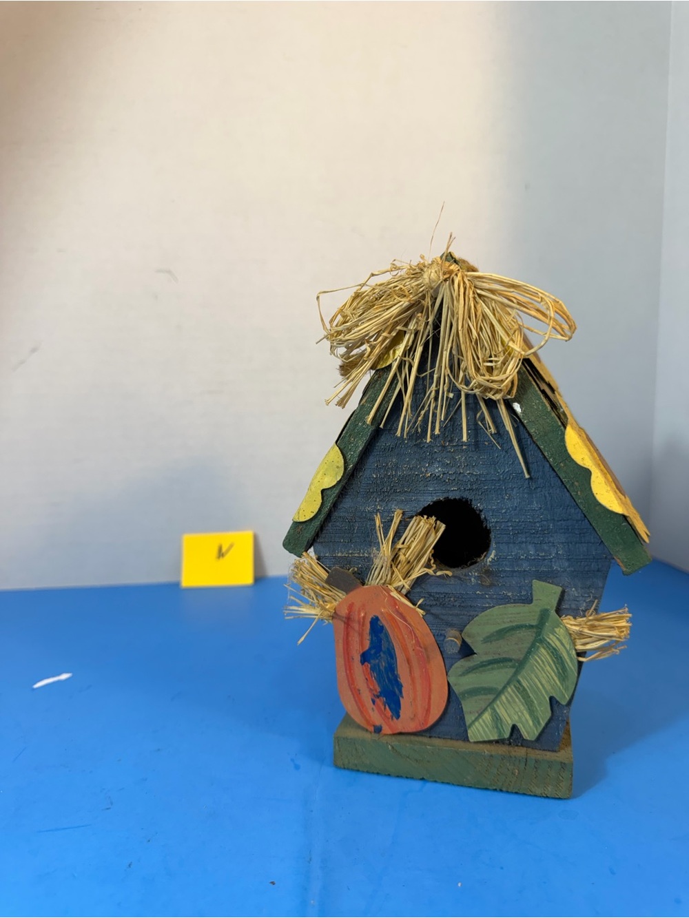 Handcrafted Blue Wood Birdhouse with Natural Straw Roof